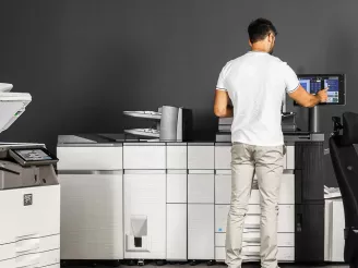 Man using light production printer