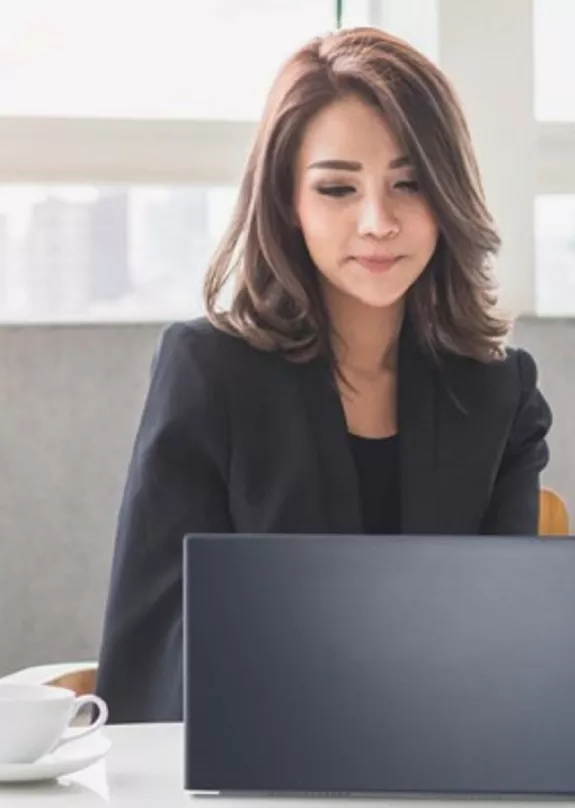 A woman using a laptop